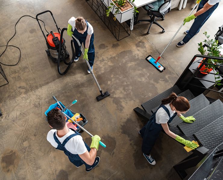 rags, bucket and spray for spring cleaning on blue